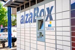 Prague,Czech republic -April 12, 2024. Alza Box is boxes for self picking up goods. Parcel box logistics standing outside for customers, delivery box of Alza retail company e-shop in Prague, Czech photo