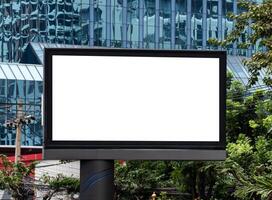 Mock up white horizontal LED display billboard pole on pathway. clipping path for mockup photo