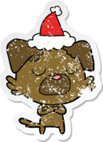 main tiré affligé autocollant dessin animé de une chien portant Père Noël chapeau png