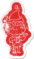 quirky cartoon distressed sticker of a friendly boy wearing santa hat png