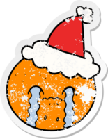 main tiré affligé autocollant dessin animé de une Orange portant Père Noël chapeau png