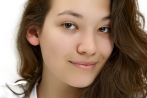 young and friendly teacher at her desk interacting the class png