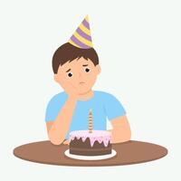 Upset kid sits at table with cake with candle. Unhappy boy spending the birthday alone. vector