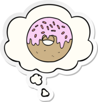 cartoon donut with thought bubble as a printed sticker png