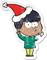 mano dibujado afligido pegatina dibujos animados de un curioso chico vistiendo Papa Noel sombrero png