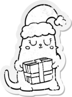 distressed sticker of a cute cartoon christmas cat png