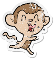 distressed sticker of a crazy cartoon monkey png