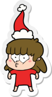 main tiré autocollant dessin animé de une sifflement fille portant Père Noël chapeau png