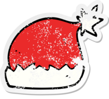 distressed sticker of a cartoon santa hat png