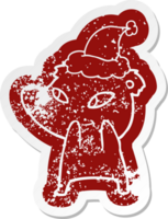 cute quirky cartoon distressed sticker of a bear wearing santa hat png