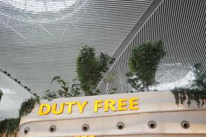 turkey istanbul 12 january 2024. Duty Free Shop in Istanbul airport Turkey. Duty free shops are retail outlets that are exempt from the payment local or national taxes and duties photo