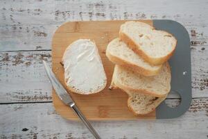 top view of butter spread on a bread photo