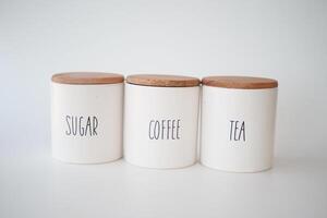 A wicker basket with tea and sugar jars for a charming tea event photo