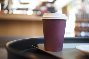 Blank take away kraft coffee cup on table , photo