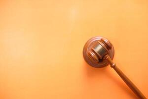 Top view of gavel on color background with copy space photo