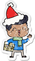 hand drawn distressed sticker cartoon of a laughing boy wearing santa hat png