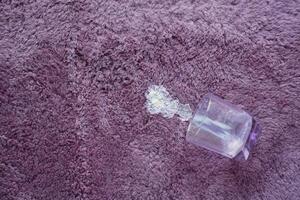 spill milk on a carpet top view , photo