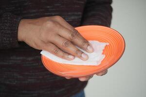 wiping plate with a tissue photo