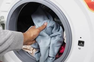 close up of cloths in a washing machine. photo