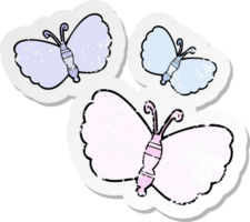 distressed sticker of a cartoon butterflies png