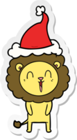 en riant Lion main tiré autocollant dessin animé de une portant Père Noël chapeau png