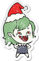 hand drawn distressed sticker cartoon of a laughing vampire girl wearing santa hat png