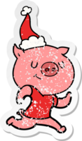 happy hand drawn distressed sticker cartoon of a pig running wearing santa hat png