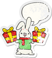 cartoon rabbit with christmas presents with speech bubble distressed distressed old sticker png