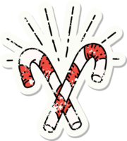 worn old sticker of a tattoo style candy canes png