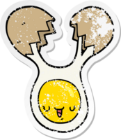 distressed sticker of a cartoon cracked egg png