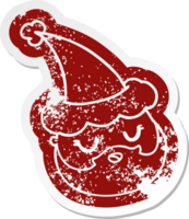 quirky cartoon distressed sticker of a male face with beard wearing santa hat png