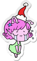 hand drawn sticker cartoon of a crying alien girl wearing santa hat png