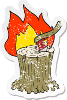 retro distressed sticker of a cartoon axe in flaming tree stump png