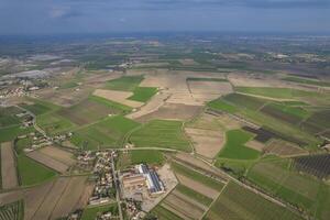 Aerial View of Farm Land and City in Pianura Padana photo