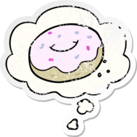 cartoon donut with thought bubble as a distressed worn sticker png