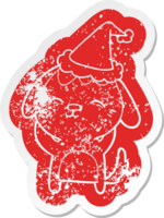 happy quirky cartoon distressed sticker of a dog wearing santa hat png