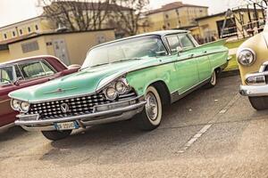 Vicenza Italy 19 March 2024 Sparkling vintage American car parked at an automotive show gathering photo