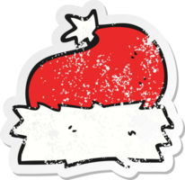 retro distressed sticker of a cartoon christmas hat png