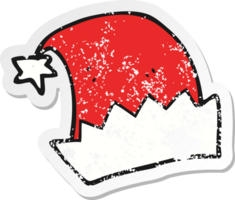 retro distressed sticker of a cartoon santa hat png