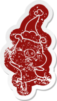 quirky cartoon distressed sticker of a furious pig wearing santa hat png