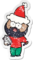 hand drawn distressed sticker cartoon of a bearded man with clipboard and pen wearing santa hat png