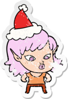 pretty hand drawn distressed sticker cartoon of a elf girl wearing santa hat png