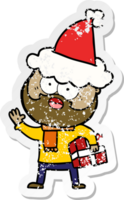 hand drawn distressed sticker cartoon of a bearded man with present wearing santa hat png
