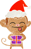 funny hand drawn retro cartoon of a monkey with christmas present wearing santa hat png