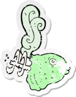 retro distressed sticker of a cartoon smelly old fish head png