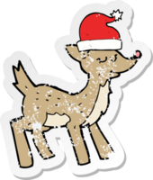 retro distressed sticker of a cartoon cute christmas reindeer png