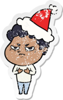 hand drawn distressed sticker cartoon of a angry man wearing santa hat png