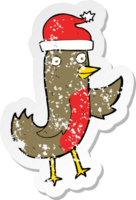 retro distressed sticker of a cartoon christmas robin wearing hat png