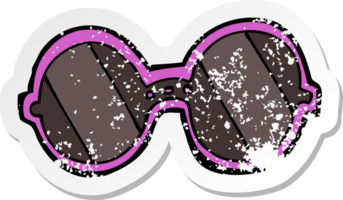 retro distressed sticker of a cartoon sunglasses png