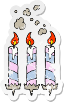 retro distressed sticker of a cartoon birthday cake candles png